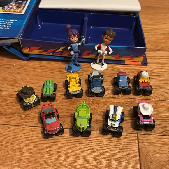 Rare Blaze Busy Book - Retails Amazon -$91.00. All 12 figurines and playmat. - Picture 2 of 3